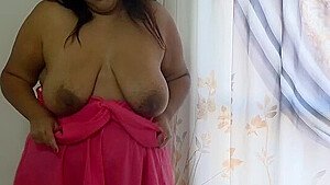 Masturbation in a pink dress